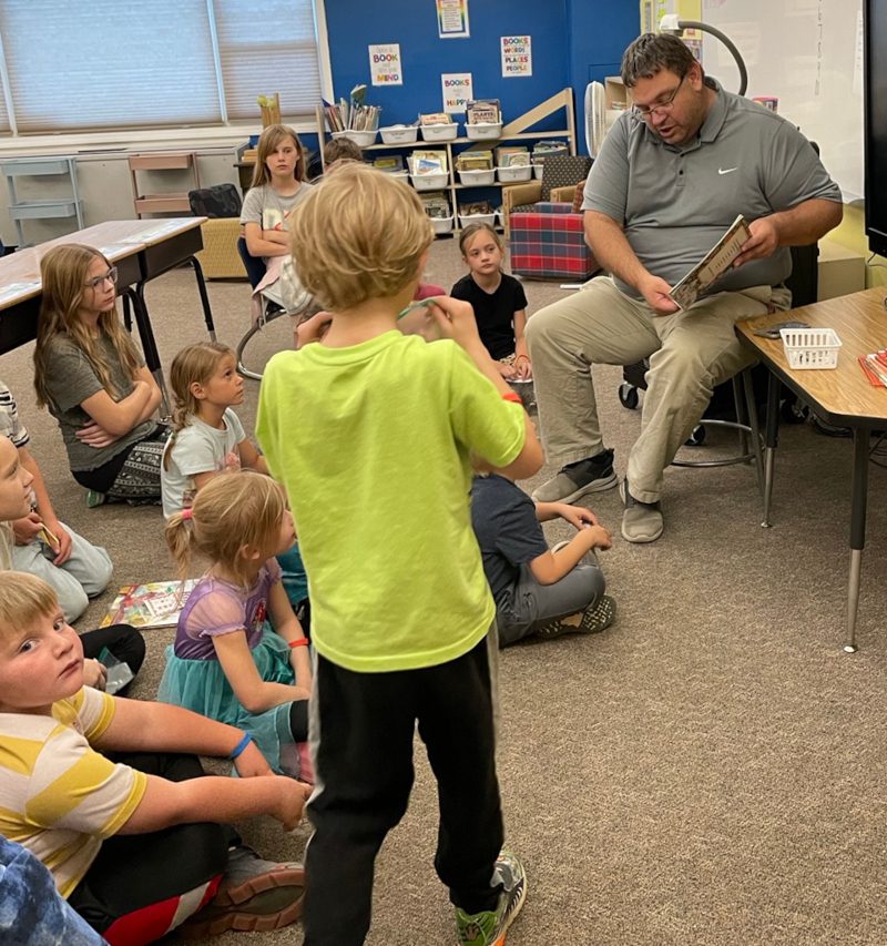 Newell Principal Steve Schoenfish read to a variety of students during the Reading Night recently.