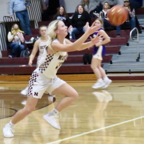 Senior Rachel Erk, #13, steals the ball from the Kougars.