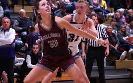 Lily Nore avoiding being blocked out under the basket. Photos Courtesy Jamie Hockenbary